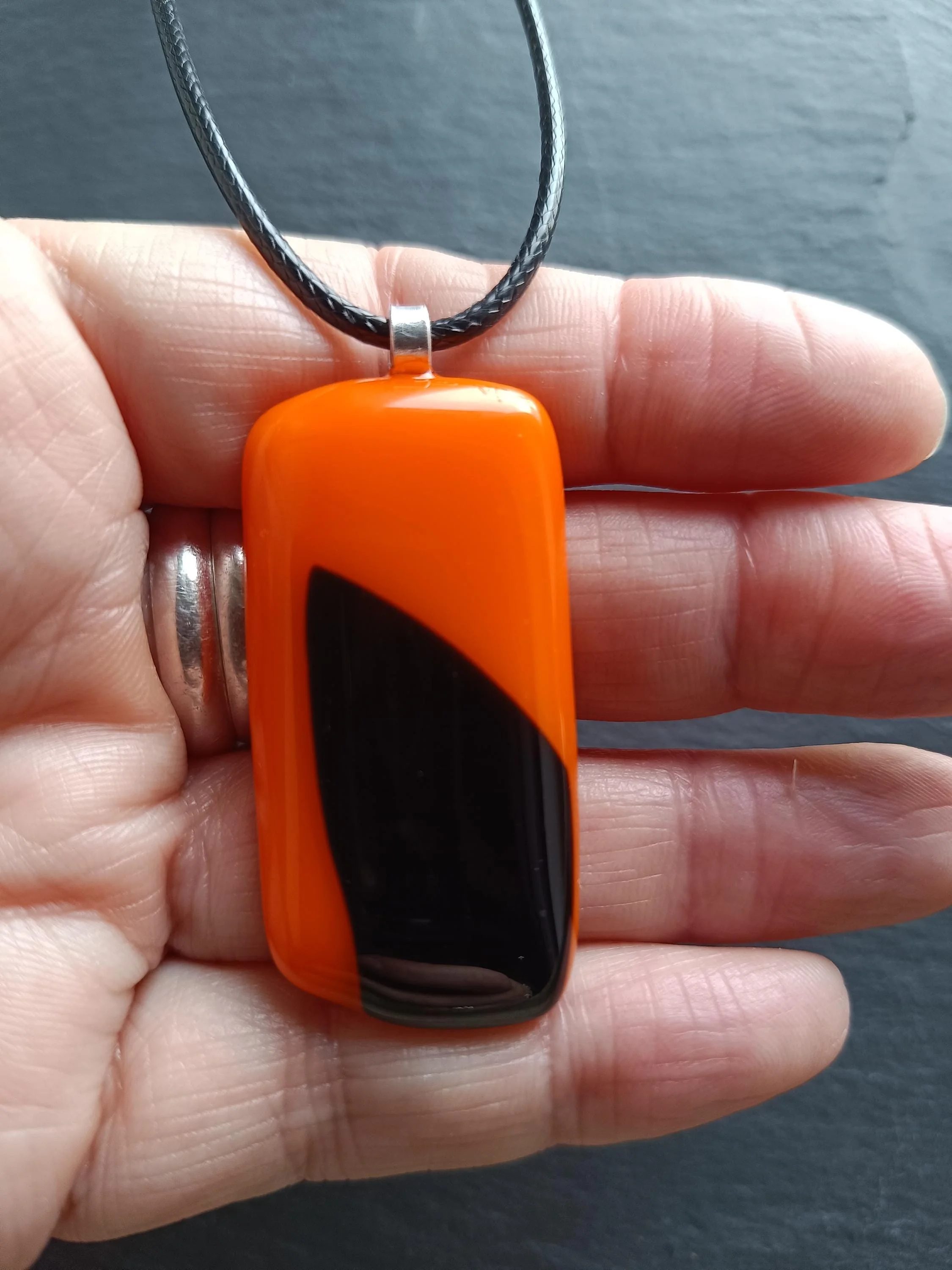 Orange and black fused glass pendant necklace - Photo 1